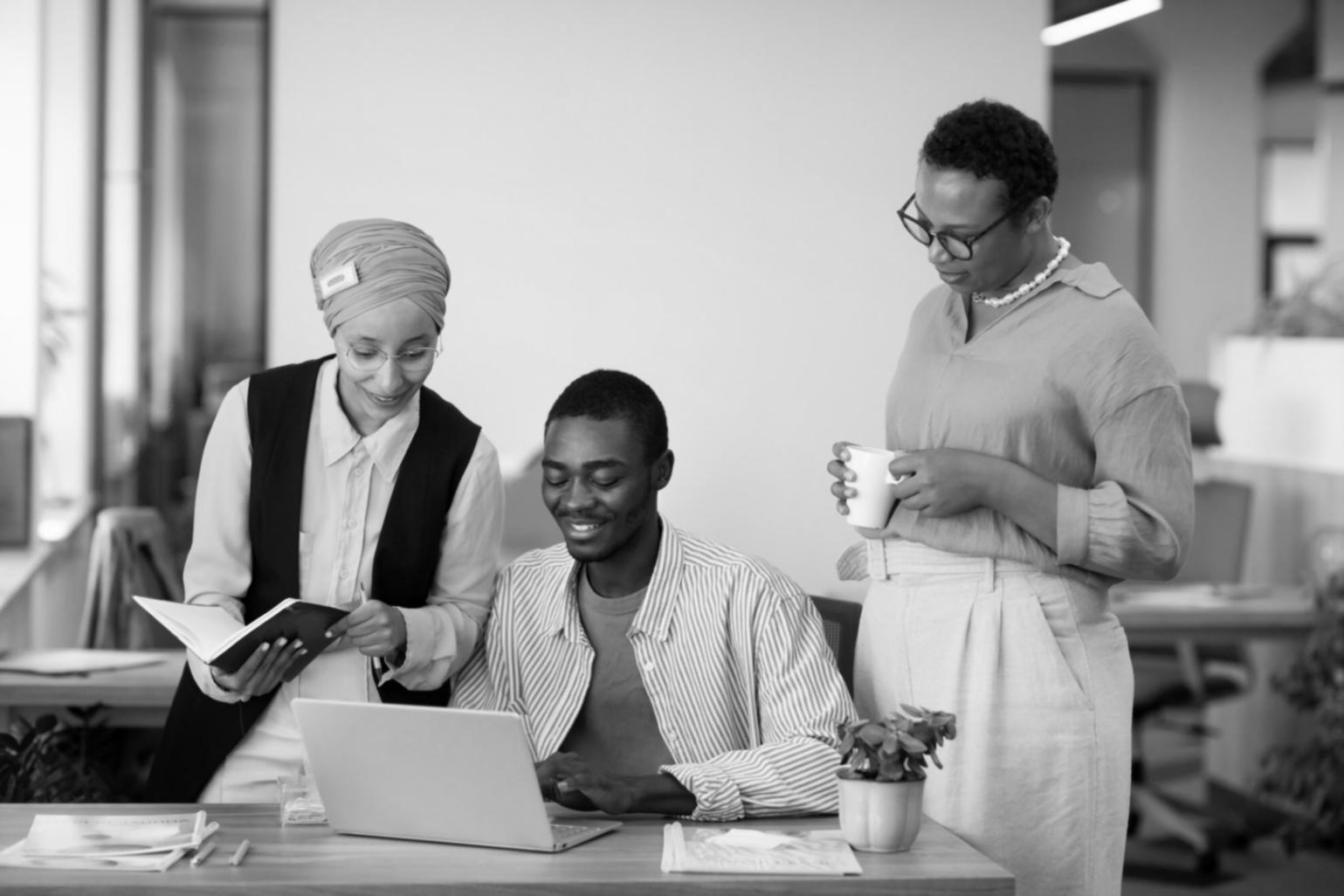 Professional financial analysts reviewing investment portfolios and market data during training session